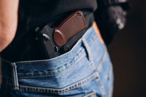 Porte ilegal de arma: tipos e consequências legais